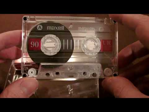 Unwrapping a Maxell UR90 audio cassette