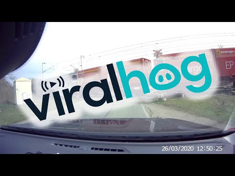 Impatient Bicycle Rider Almost Hit by Train || ViralHog