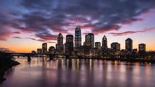 Philadelphia skyline at sunset, glowing towers and river reflections 🌆  No Copyright – Time Lapse