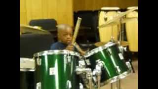 Kevin playing drums for his little brother. He's able