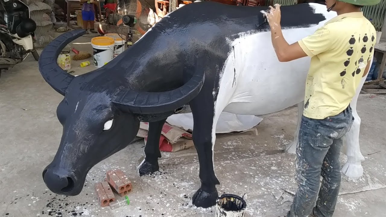 Sculpture rendering buffalo using cement and sand by Creative VN