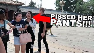 CHINESE GIRL PISSES HER PANTS!!!