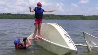 preview picture of video 'Capsize recovery of a Sunfish by a 7-year-old (third attempt)'