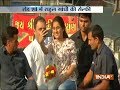 Girl takes a selfie with Rahul Gandhi during his roadshow in Bharuch