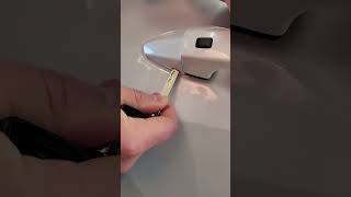 How to expose the key hole on a Kia.