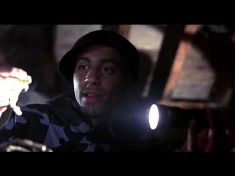 Bones (2001) trailer still with Snoop Dogg as Jimmy Bones in crimson-lit hallway