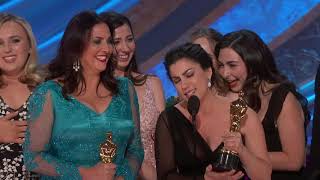 Rayka Zehtabchi and Melissa Berton took to the stage when their documentary short Period. End of Sentence. won in 2019. The film follows women in India who make affordable sanitary products in a region where most women previously went without. Watch Period. End of Sentence. on Netflix. 