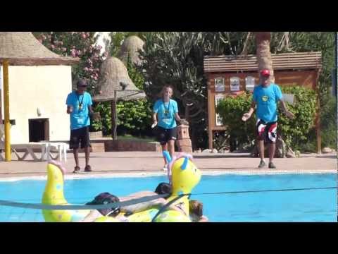 Park inn's animation team dancing to La bomba by the pool