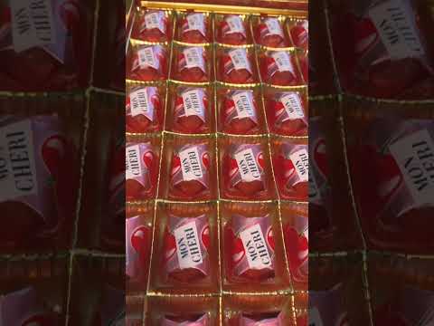 Unwrap Mon #Chéri - #cherry floating in #liqueur and bittersweet #chocolate