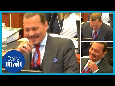 Johnny Depp laughs during doorman's hilarious deposition