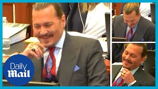 Johnny Depp laughs during doorman's hilarious deposition