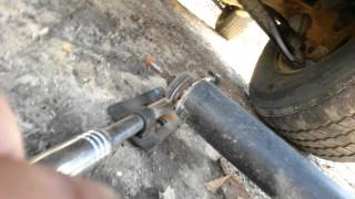 How to replace ford escape rear shock absorber