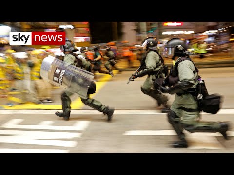 Police fire tear gas at protesters in Hong Kong