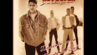 REVOLVER - Tormenta en la Puerta del Sol