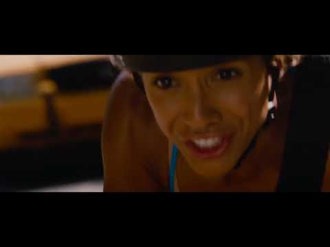 Premium Rush trailer still with Joseph Gordon-Levitt speeding on a fixie through Manhattan traffic