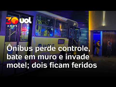 Ônibus perde controle, bate em muro e invade motel; dois ficam feridos