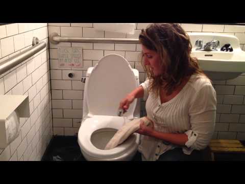 Part of a video titled How to Use A Diaper Sprayer for Cloth Diapering - YouTube