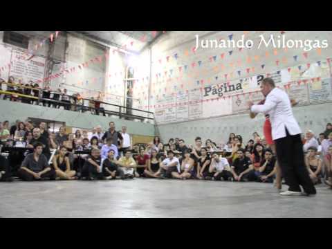  Sebastian Missé  and  Andrea Reyero  are  dancing  to  the  milonga  "  Milonga Del Ochenta Y Tres  "