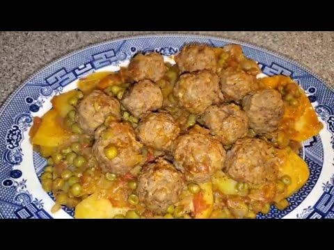 Tajine Kefta. Tajine Meat Balls, Potatoes And Sweet Peas