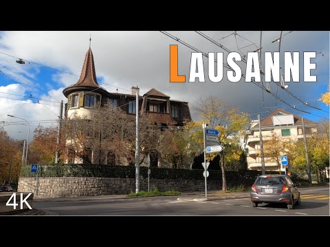 Lausanne, the Olympic Capital - driving downtown. Switzerland 4K