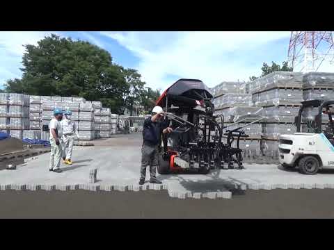 インターロッキングブロック舗装　機械施工省力化オプテマス　Optimas Paver Laying Machine S19  ハニカムロードシステム