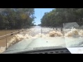 Crossing flooded river and bridge.