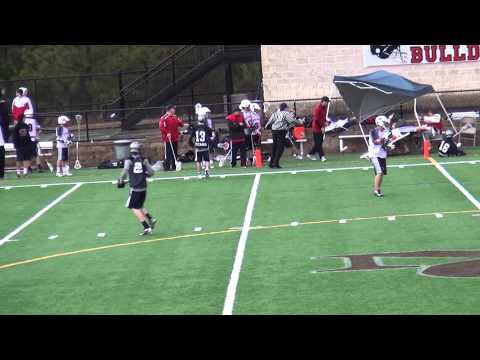 Suwanee GA lacrosse player takes a dive through the stats table during a game
