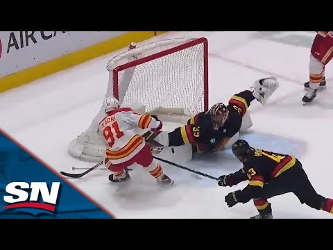 Overtime Of The Year? Flames And Canucks Battle It Out In Back-And-Forth Thriller | FULL Highlights