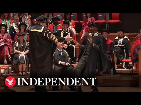 Student breaks into epic celebratory dance at graduation ceremony