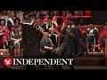 Student breaks into epic celebratory dance at graduation ceremony
