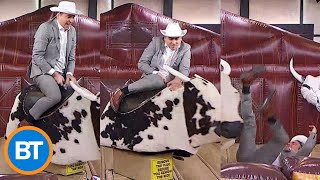 Sid rides a mechanical bull on LIVE TV for a great cause