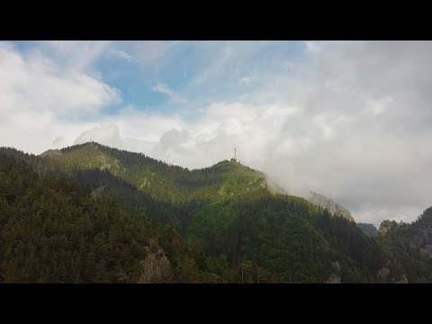 Scattered clouds at Cozia Peak - Carpathian Mountains (Drone Video)