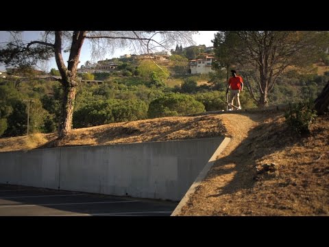 SKATEBOARDER OLLIES A HUGE CLIFF  ???