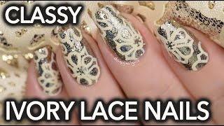 Classy ivory lace nail art over chrome flakie base