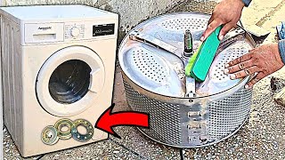 Front-Load Washing Machine Fix: Drum Clean, Bearing Change & Assembly