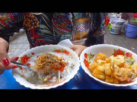 $0.75 pork porridge with fried noodle - Phnom Penh street food at Boeng Trabaek market