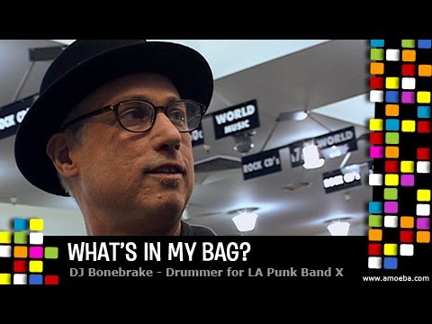 Thumbnail for DJ Bonebrake (X)'s "What's In My Bag?" | Amoeba Music by R.E.M., Queen, The Hives, The Pogues, Led Zeppelin, The Stooges