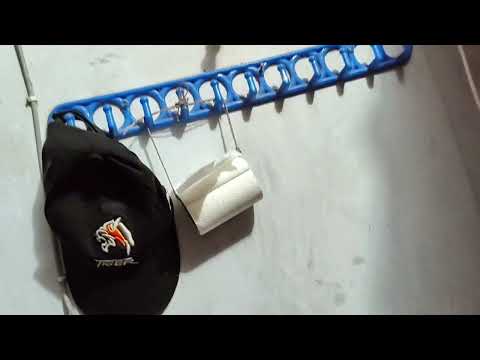 It's mounted on the wall to hang dresses, and I've hung tissues there.