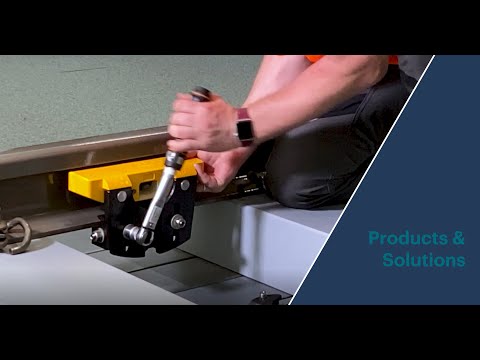 Simple mounting of  Wheel Sensor RSR123 onto the track with Frauscher Rail Claw SK150