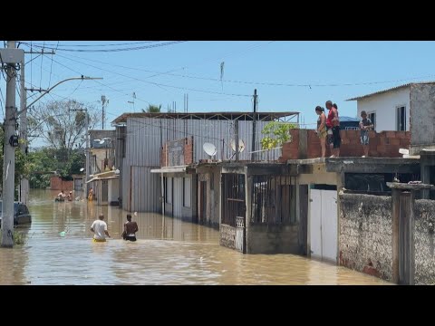 In Brazil, Rio's suburb residents face torrential rains | AFP