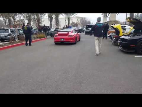 Crazy lady throws coffee at corvette during exotic car meet Video