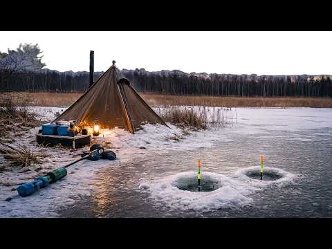 Hot tent in a blizzard Fishing and camping with a dog