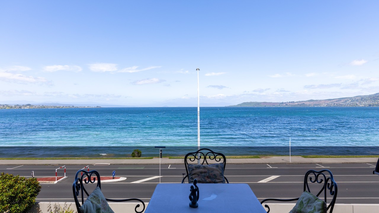 Coveted Lakefront Living with Iconic Lake Views