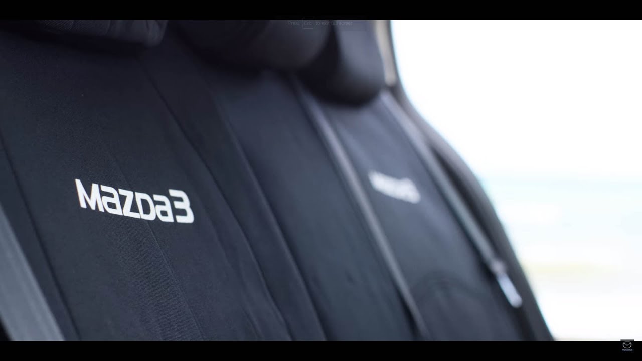 Watch video Mazda3 - Rear Seat Covers Now Mazda3 - Rear Seat Covers