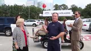 Shirley Gary and Tom Kunz accept Anthony Hitt's ALS Ice Bucket Challlenge
