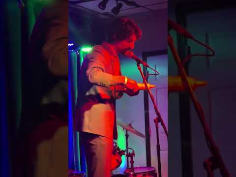 Sam's full performance as bible salesman/standup comedian