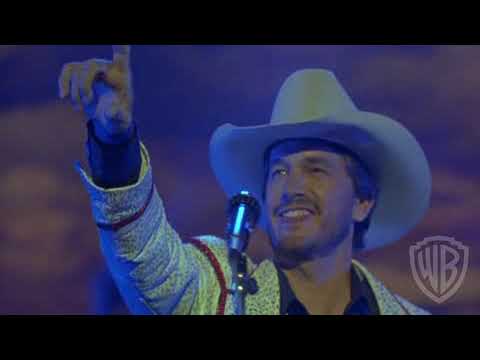 Trailer end card with Pure Country title over sepia rodeo lights
