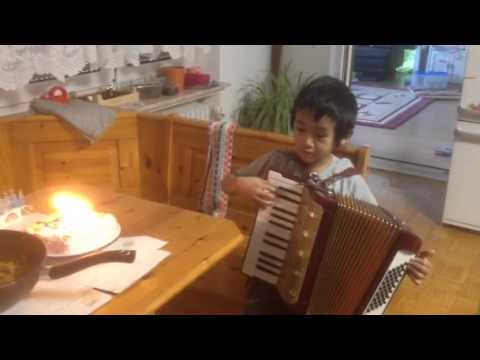 Fatih plays accordion