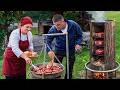 Cooking Tender Lamb Ribs And Homemade Cheese In The Mountains