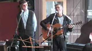 Dark as a Dungeon by Merle Travis